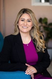 Professional headshot of attorney Marissa Canales Nava smiling in business attire